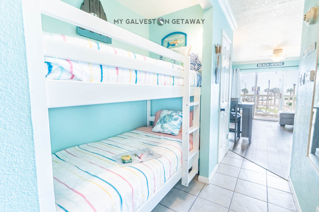 Across the hall in the alcove are bunks