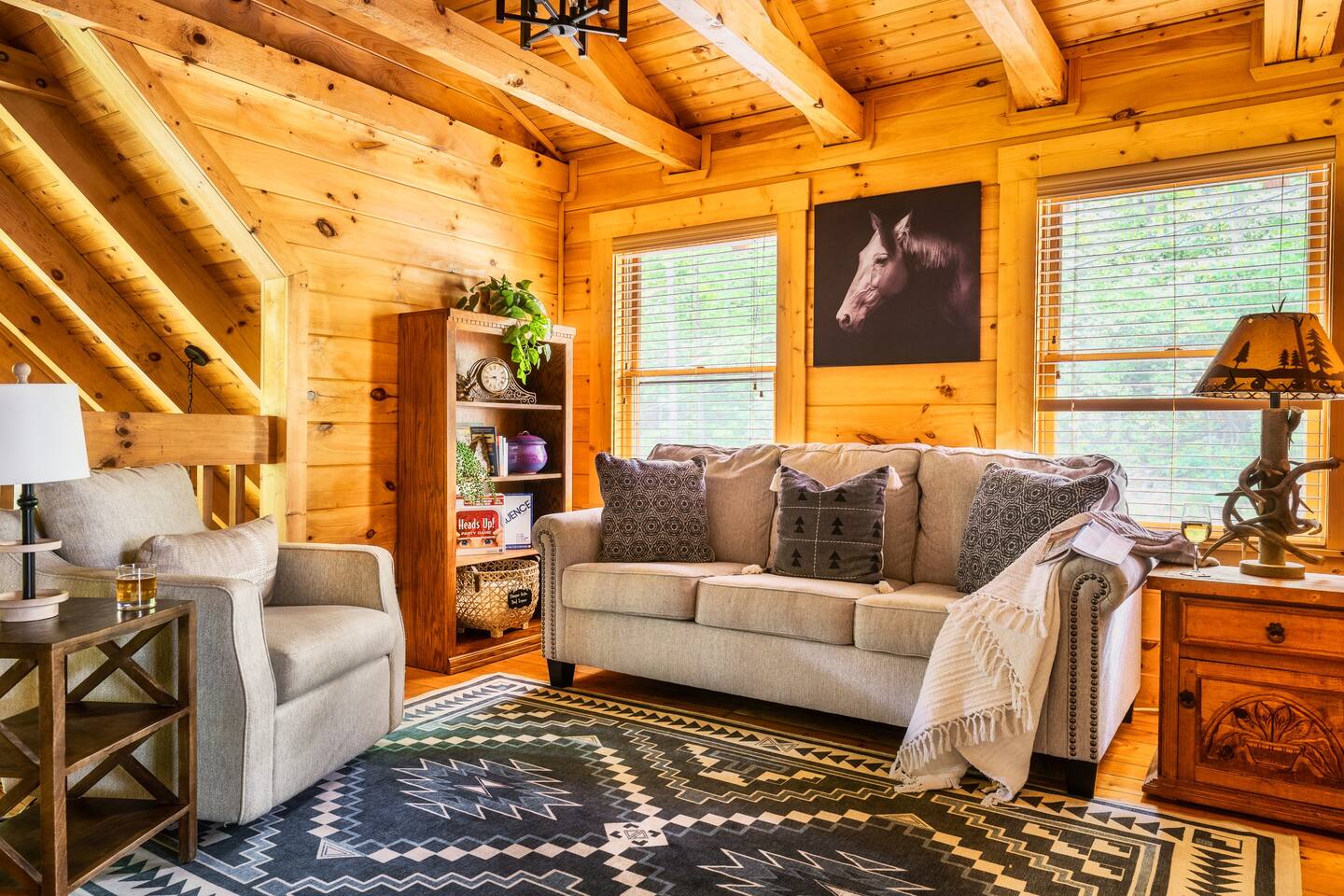 Loft area with queen pull out sleeper sofa.