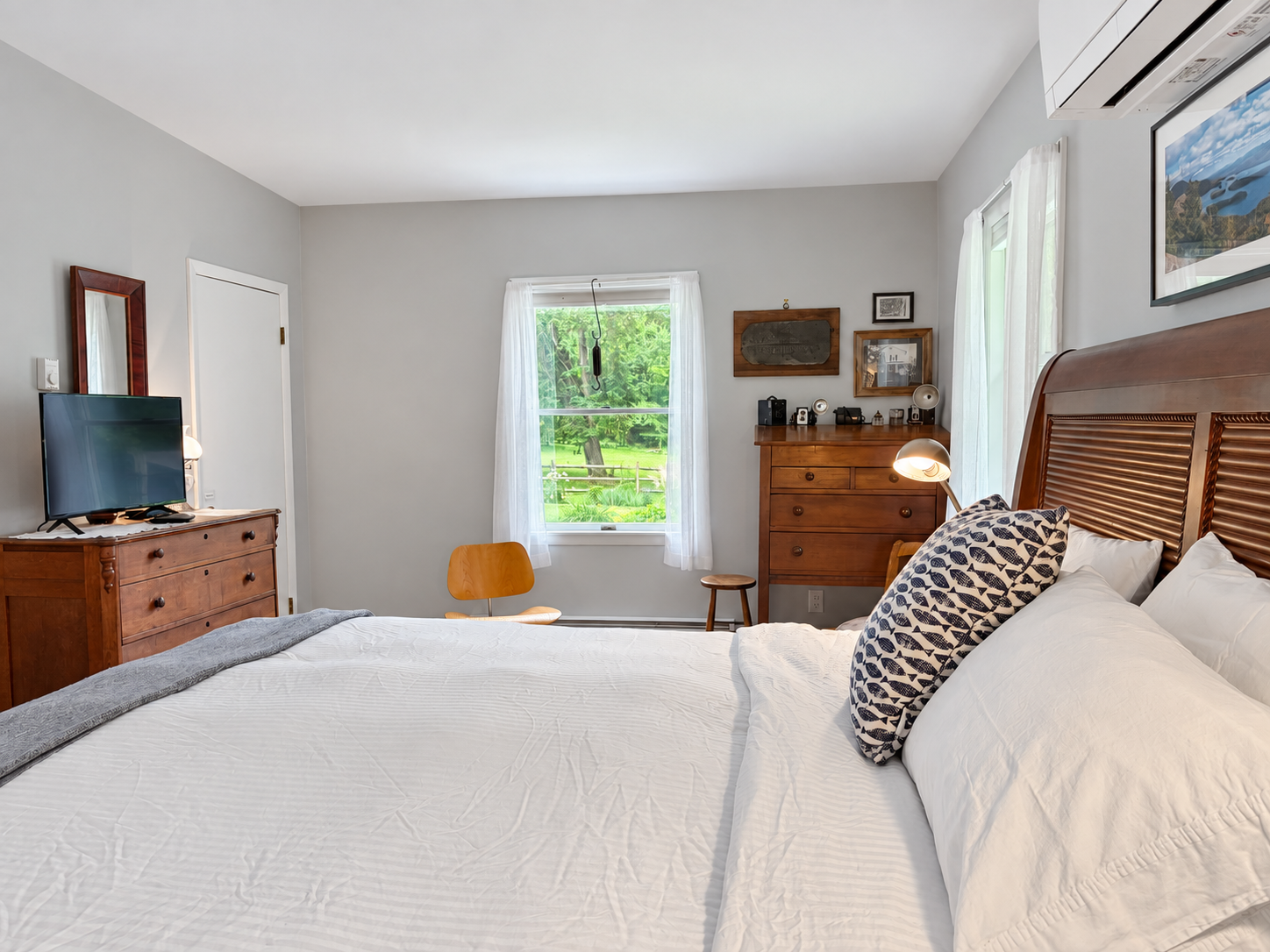 King bedroom with TV.