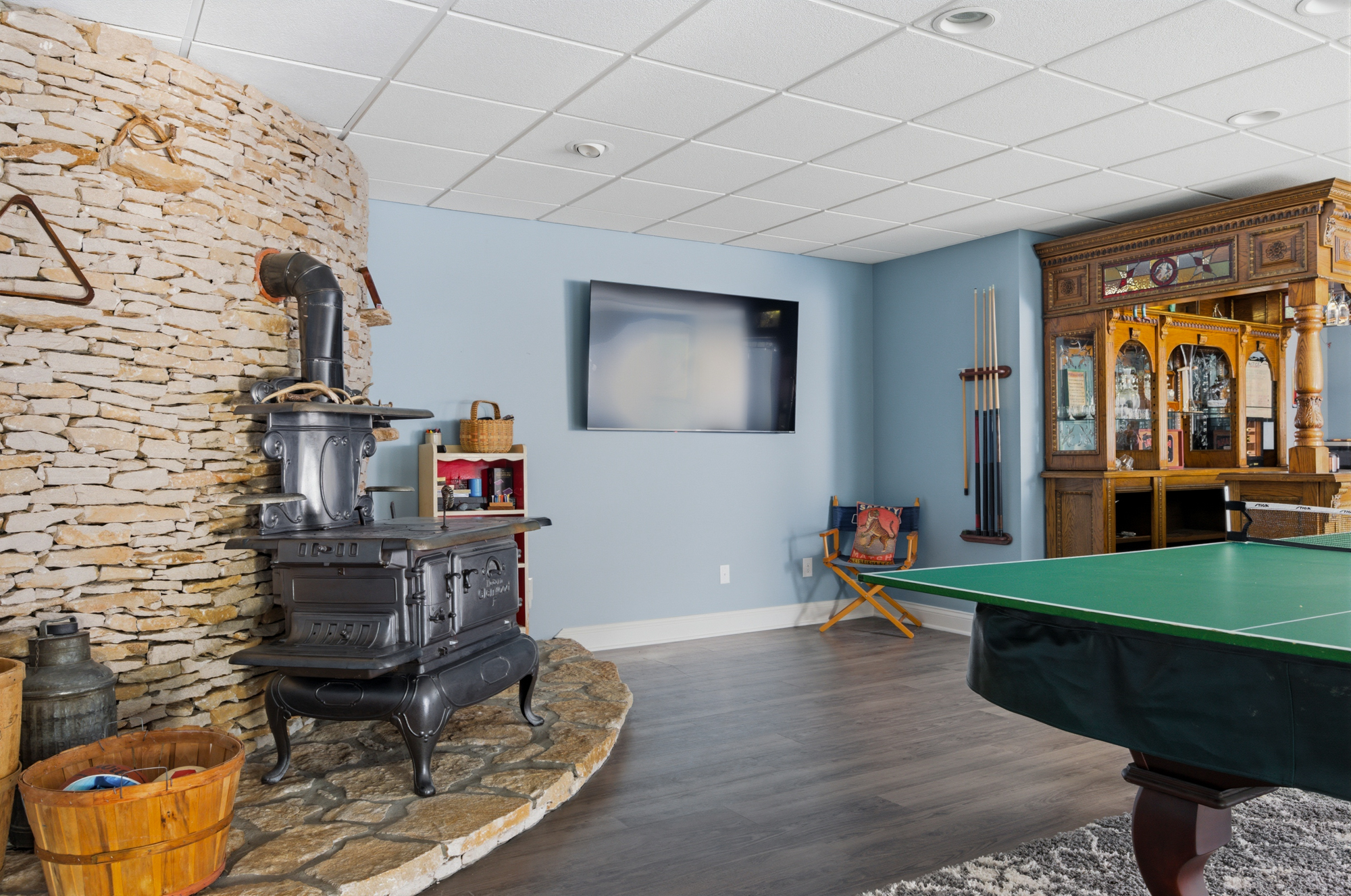 Ping Pong / Pool Table, Wood Stove (decorative), and Bar area