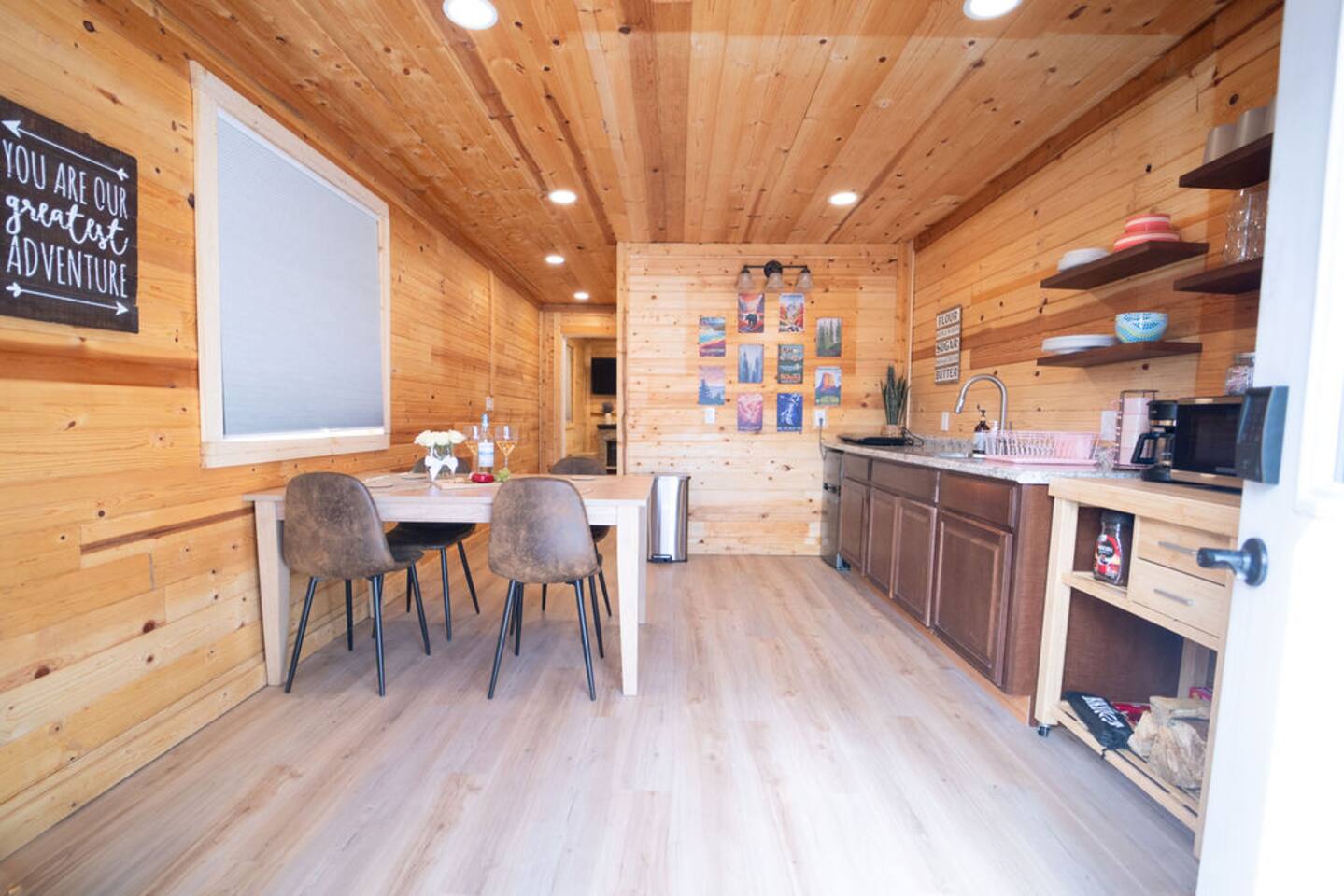 Come on in! Tiny Elk Retreat opens up to good vibes, great meals, and even better company — with a full kitchen and dining space ready for pancakes, game nights, and everything in between.