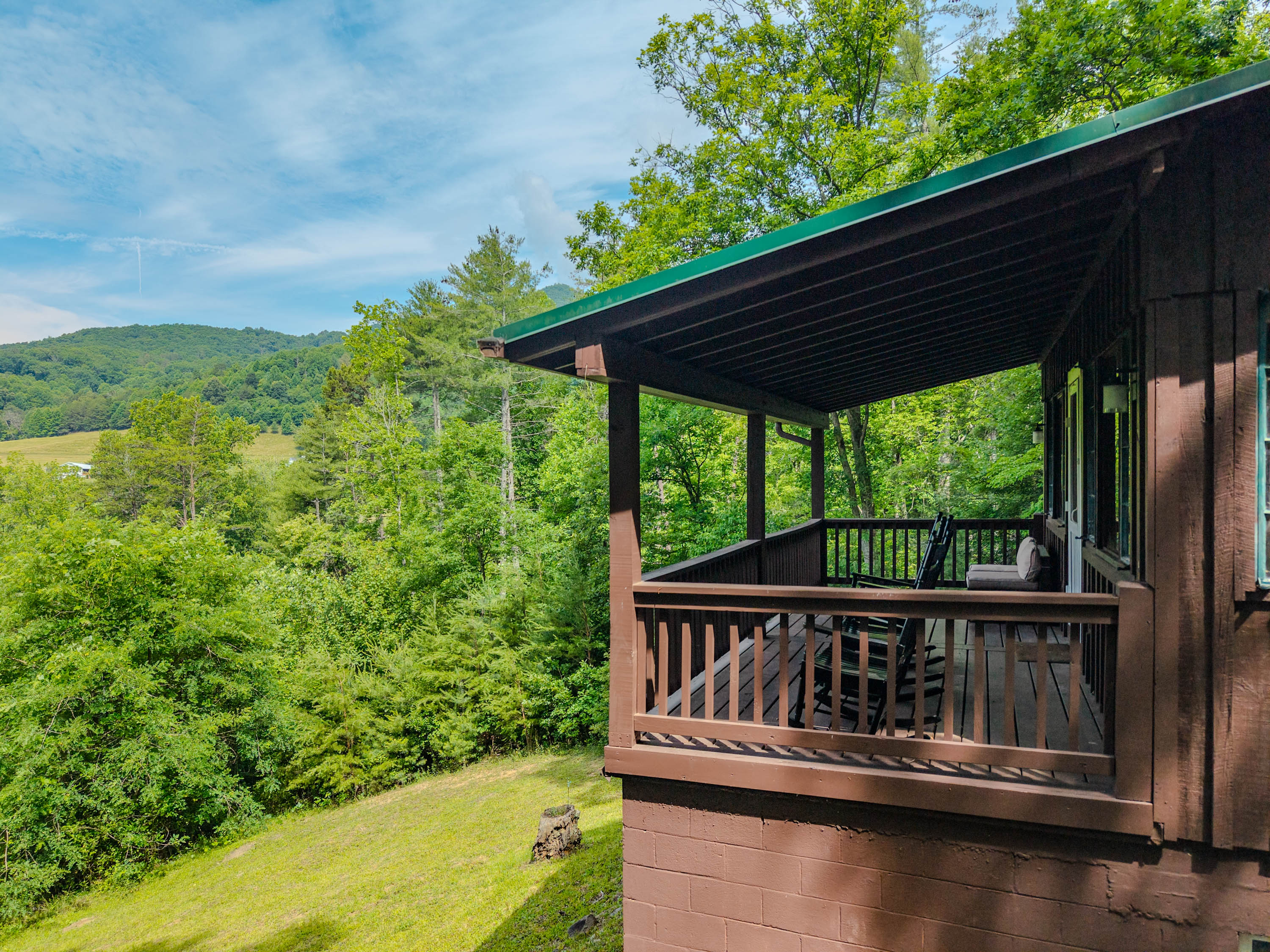 Enjoy the rocking chairs while overlooking the mountains!
