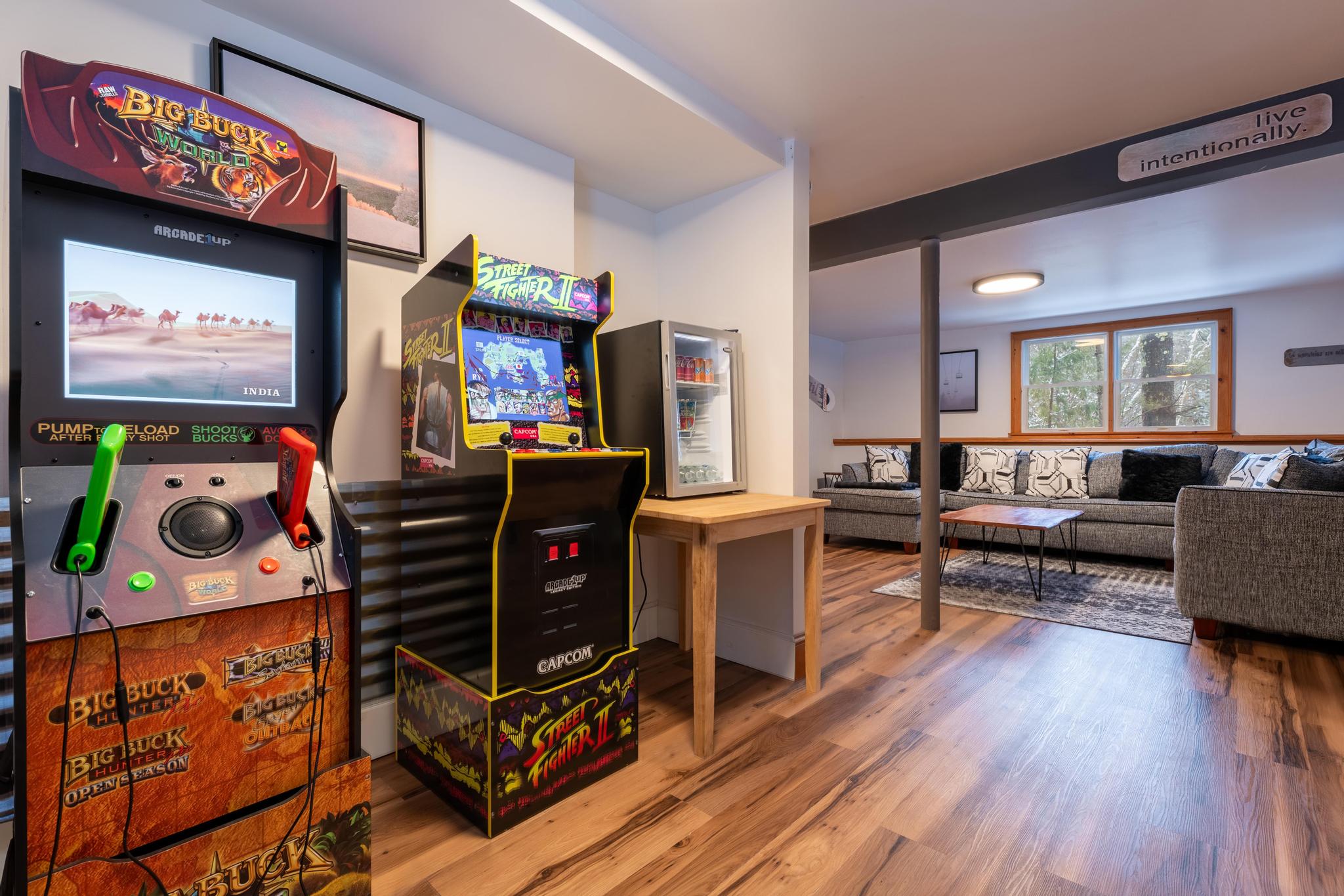 Arcade room with stocked mini fridge