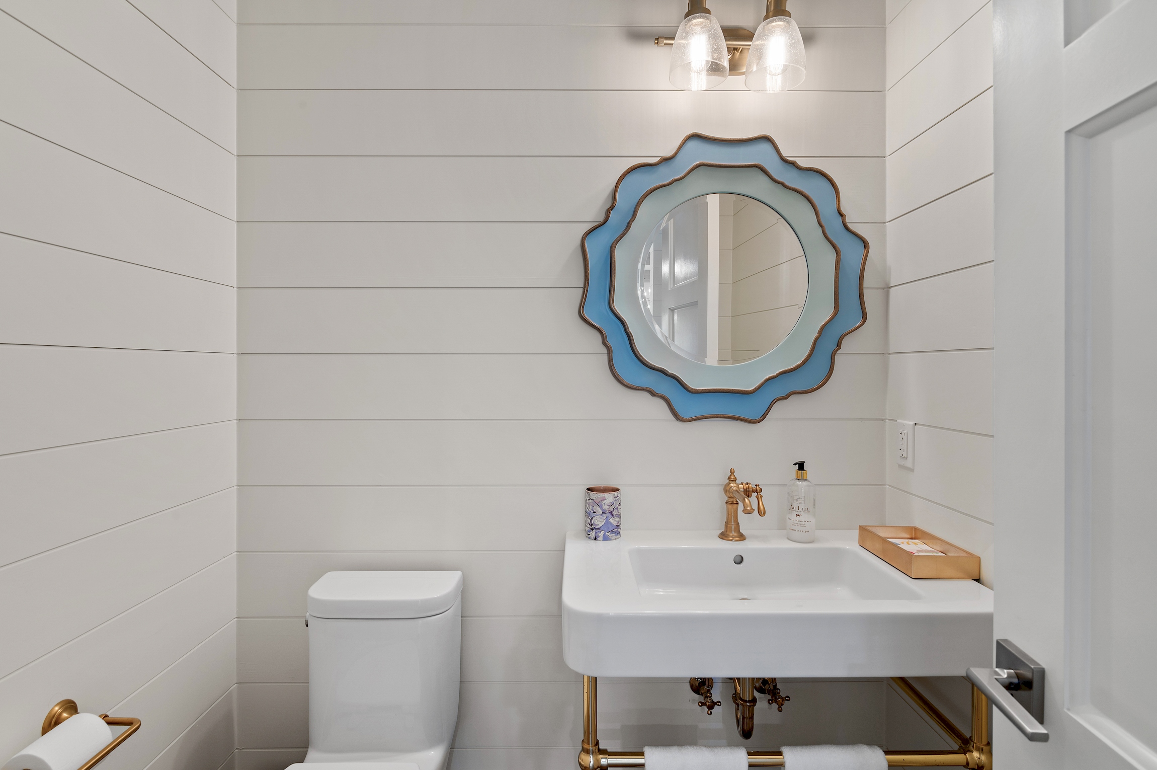 Powder bathroom is just off the kitchen and living area.