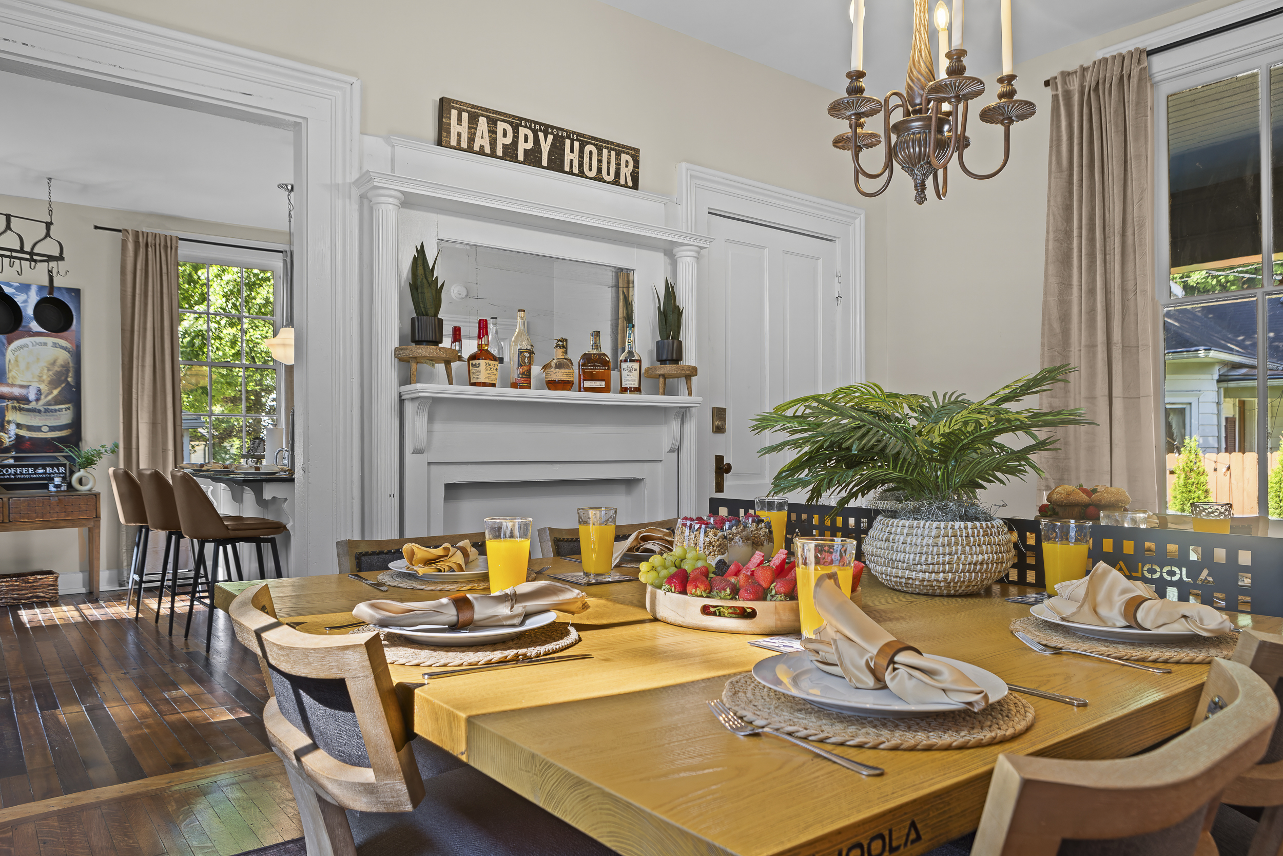 Brunch is served, with fresh fruit, orange juice, and a beautifully set table ready for the group's first morning together.