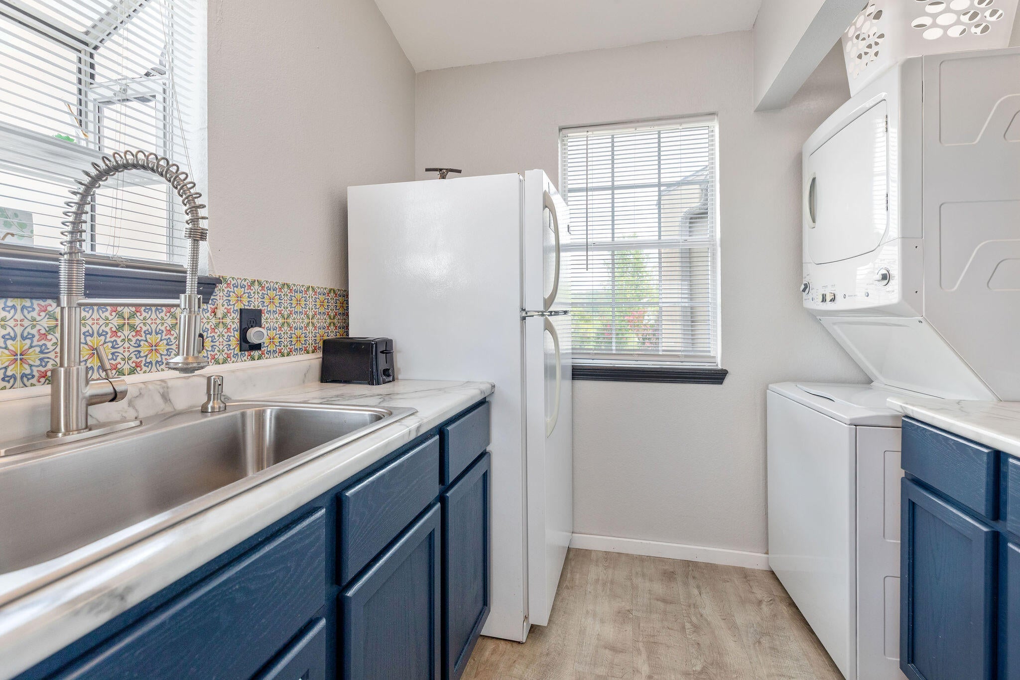 Full size fridge. Full size washer and dryer.