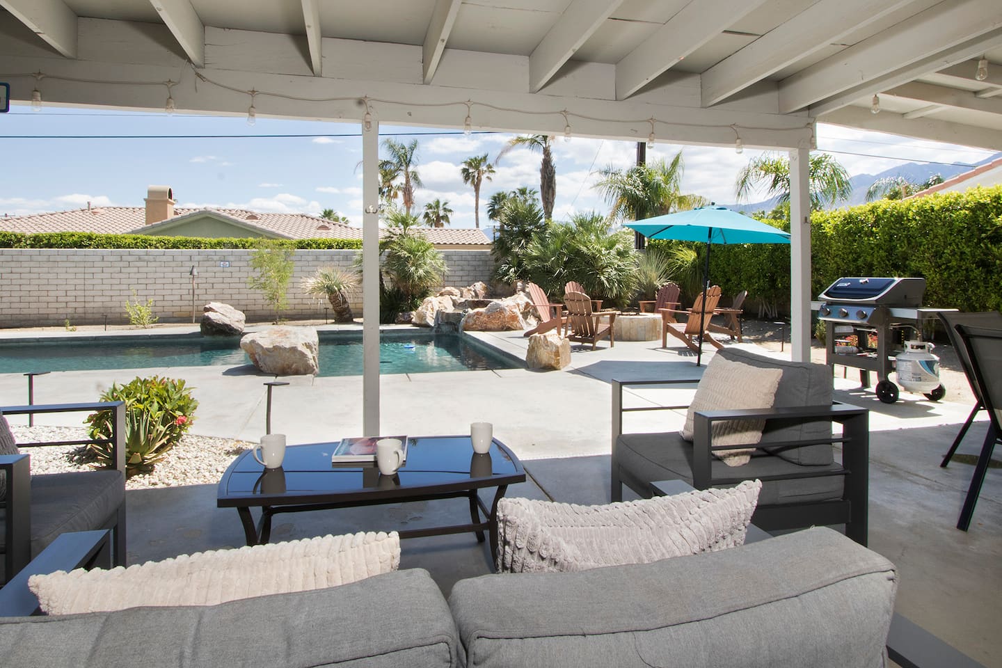Outdoor lounge area near the pool! Great for morning coffee or relaxing in the shade while others swim. 