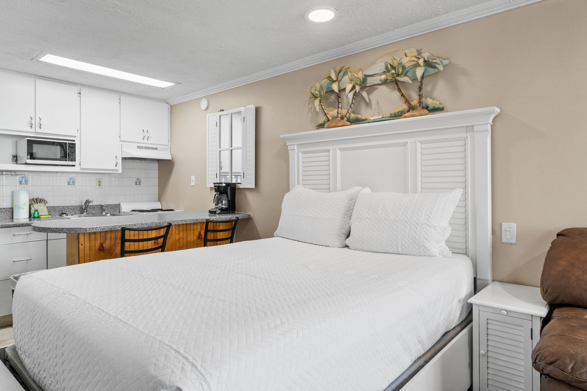 Living Area with Queen Bed and Sleeper Sofa