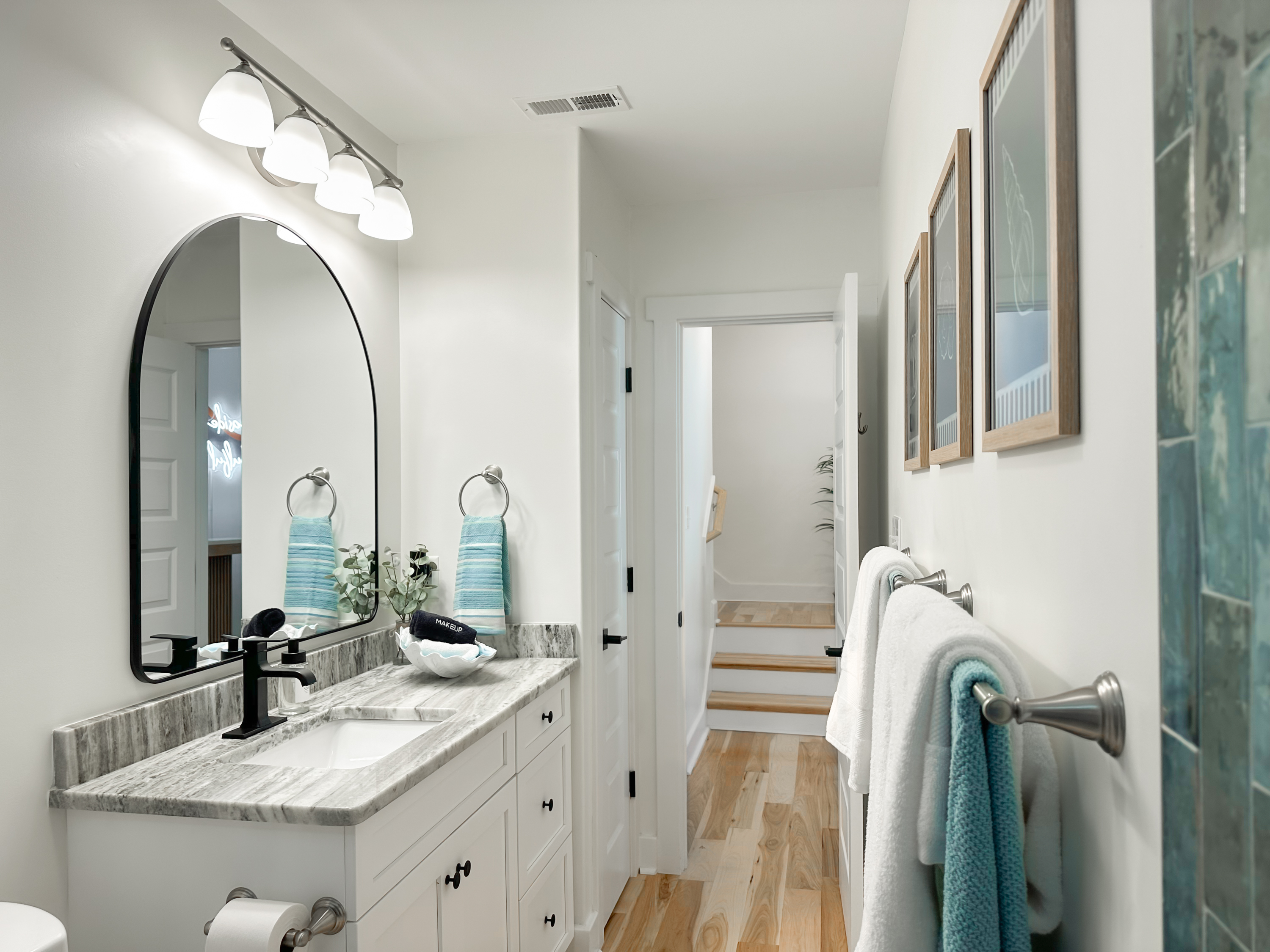 The downstairs bathroom has a large vanity.