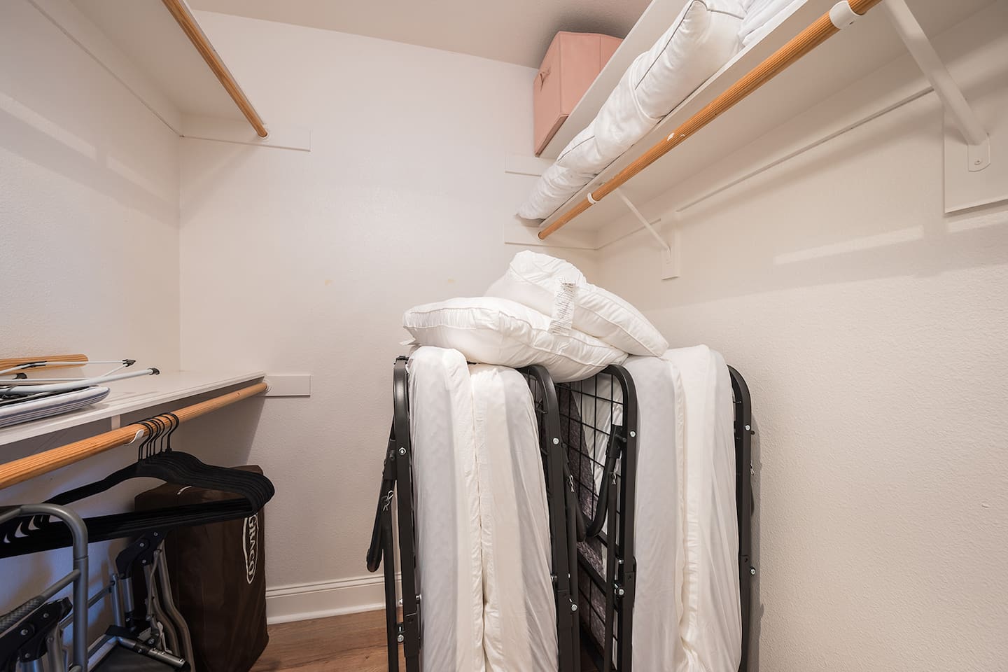 Two roll away twin beds in primary closet