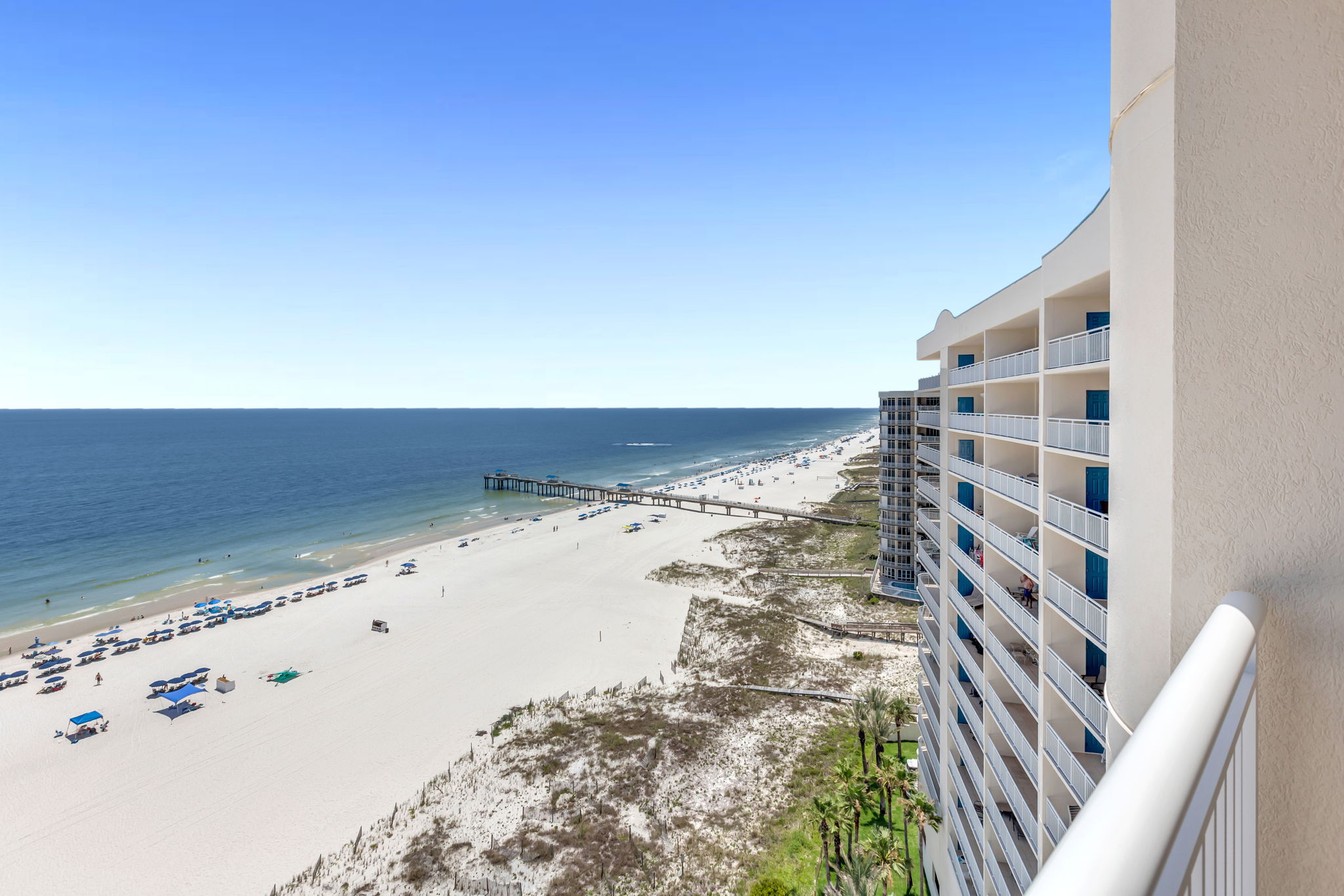 This prominent beachfront building stands as a testament to coastal architecture, providing residents and guests with an unparalleled seaside experience.