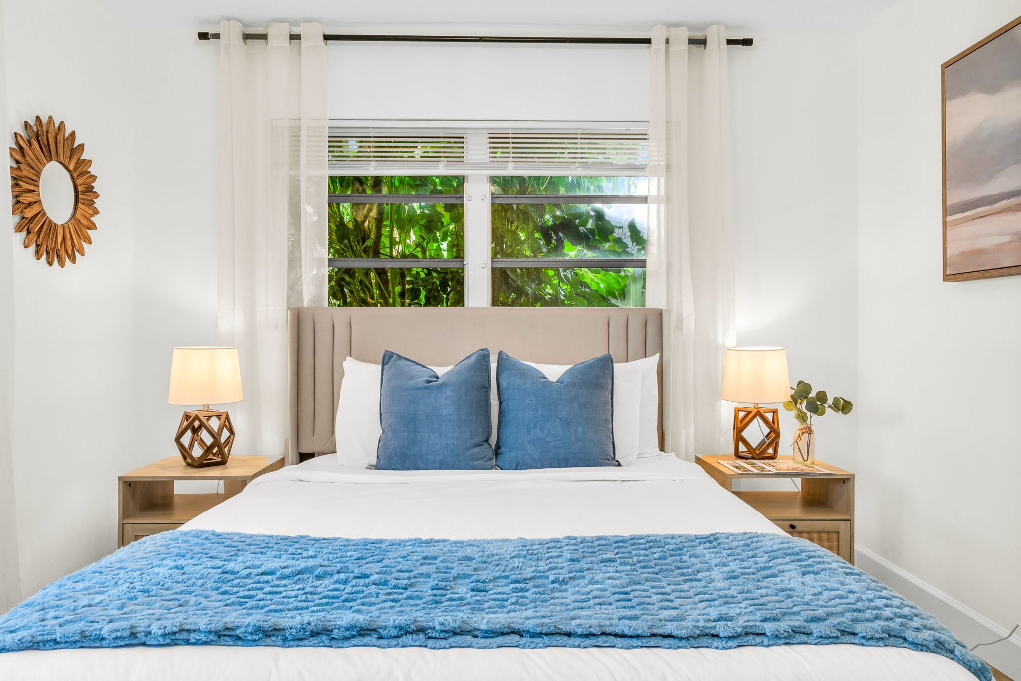 3rd Bedroom: Relax in this stylish queen bedroom with a comfortable queen bed, chic modern accents, and thoughtfully curated décor. The room is designed for comfort and convenience, offering a cozy and serene space to unwind.