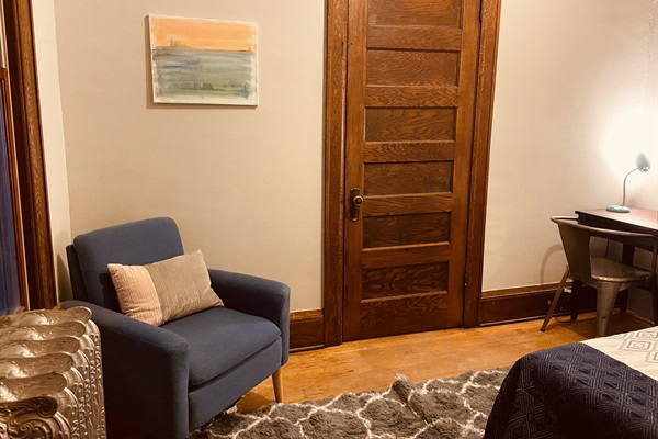 Cozy reading nook in twin room.