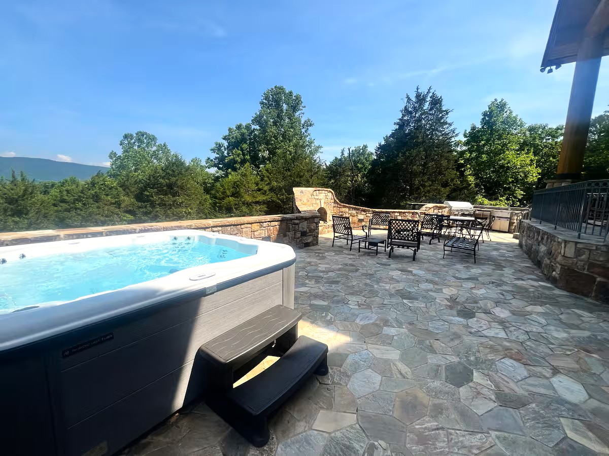 Soak in the hot tub while enjoying breathtaking Shenandoah mountain views