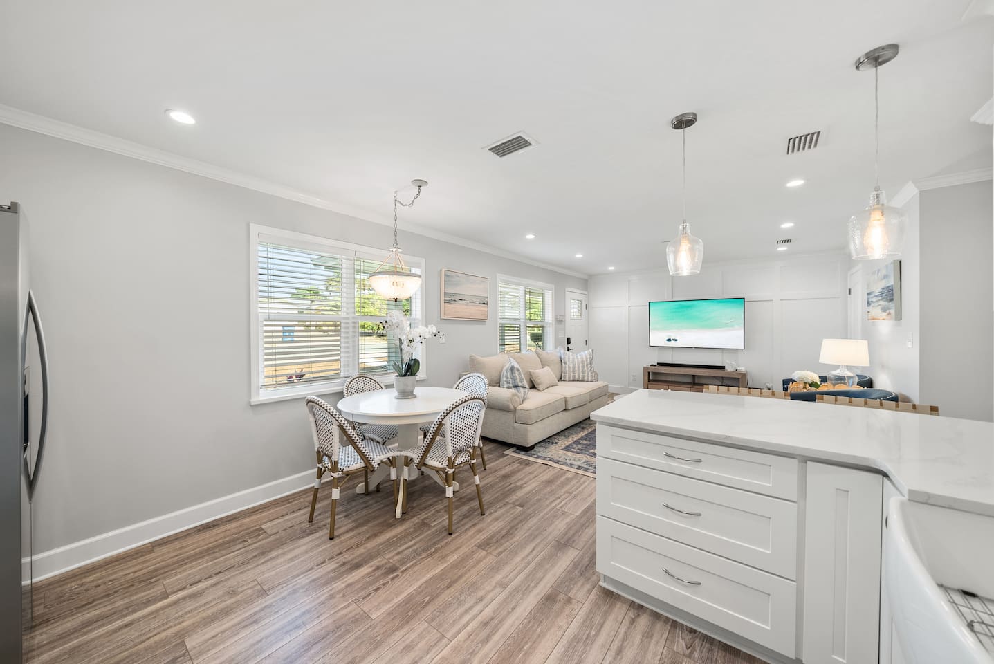 Seating for up to 4 people at the dining table and seating for up to 2 at the breakfast bar