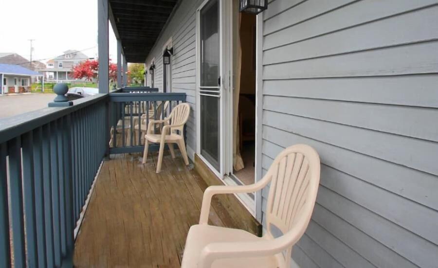 This first floor main building unit features a small deck patio to enjoy the fresh salty air of Wells Beach