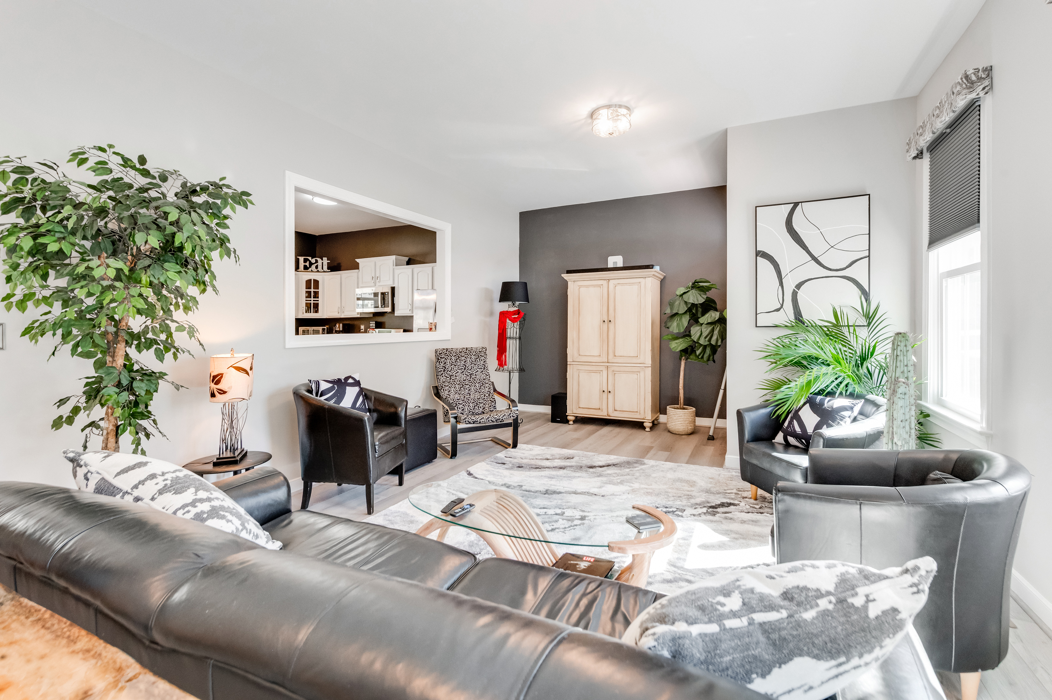 Living Room: Bright open space with modern decor, perfect for relaxation and gatherings!