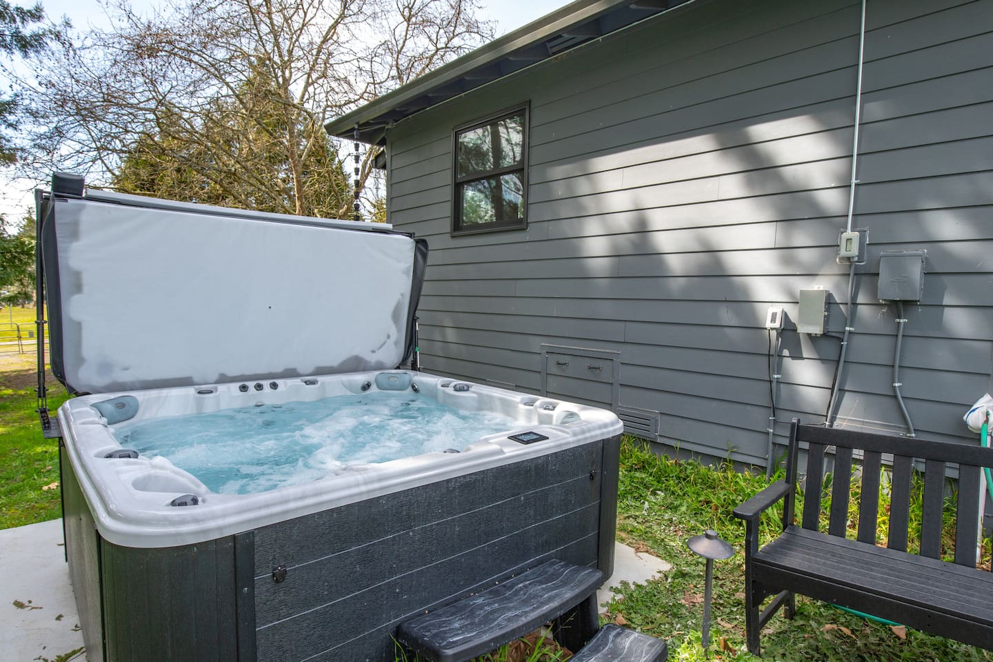 Serenity in every bubble: Unwind in our inviting hot tub oasis.
