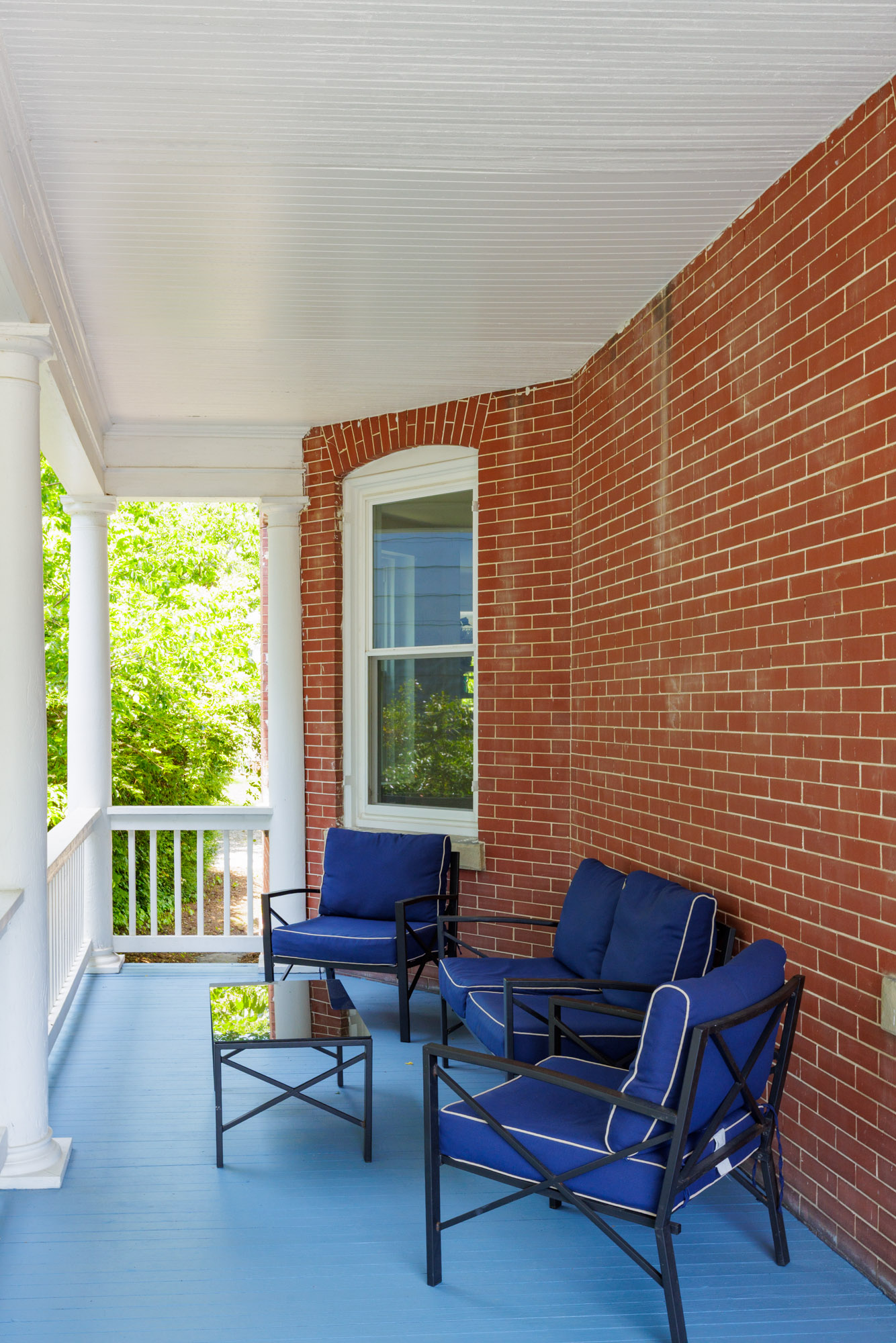 Large Wrap around porch with privacy around the corner if a guest is to stay in the other unit.