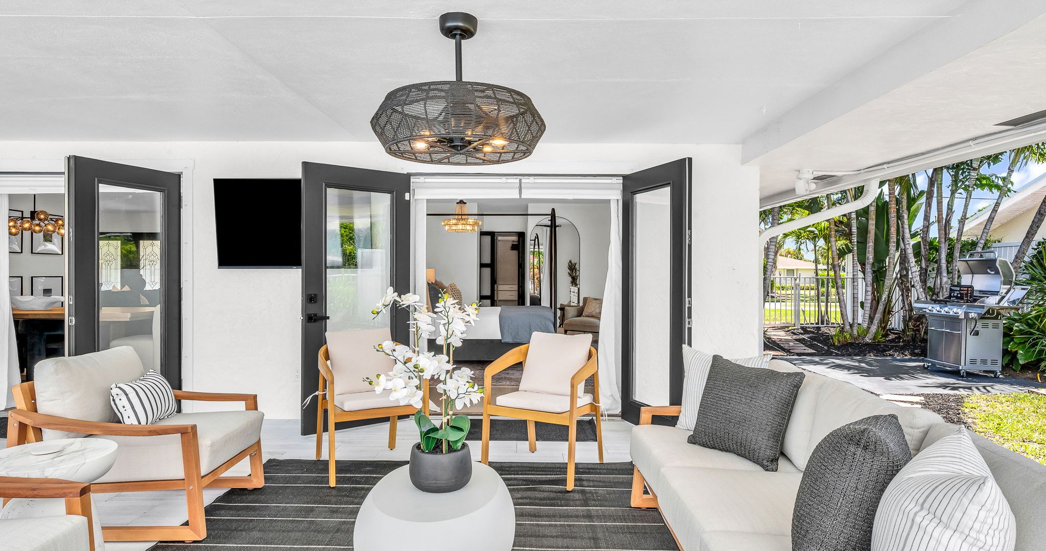 Designed for luxury and comfort, this outdoor space invites you to dine, relax, and unwind in true resort fashion. Enjoy poolside loungers, shaded patio seating, and an ambiance that blends modern elegance with the ease of Florida living
