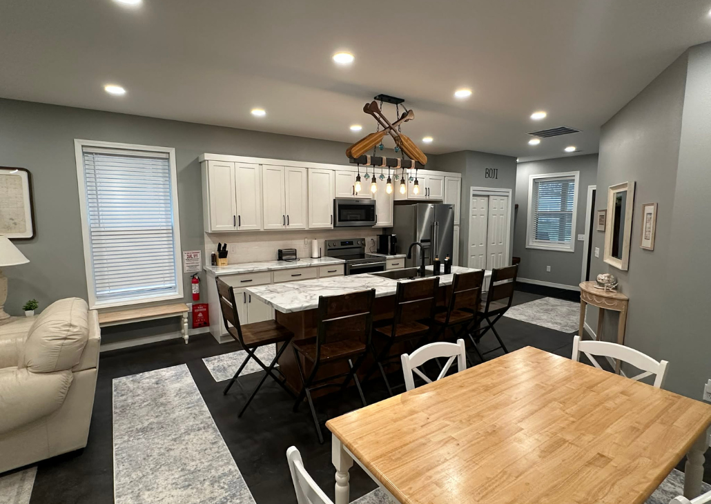NEW HOUSE: View of kitchen and dining room.