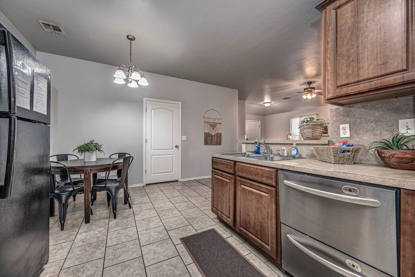 Spacious kitchen with seating for four—perfect for meals or game nights.