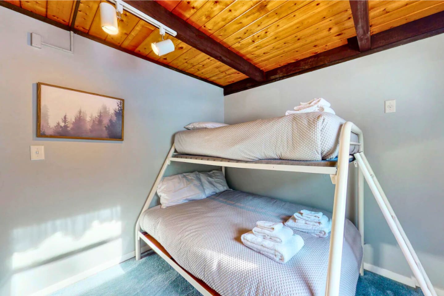 Cozy bunk bed with a double and single mattress located on the first floor on the property! 
