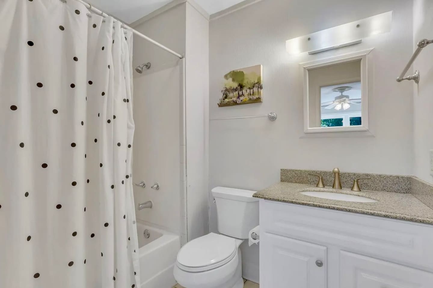 Bathroom with tub and shower