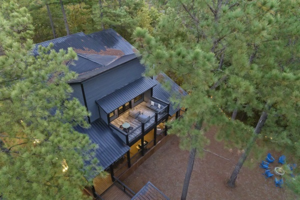From above, the open deck showcases its generous layout and seamless connection to the natural surroundings