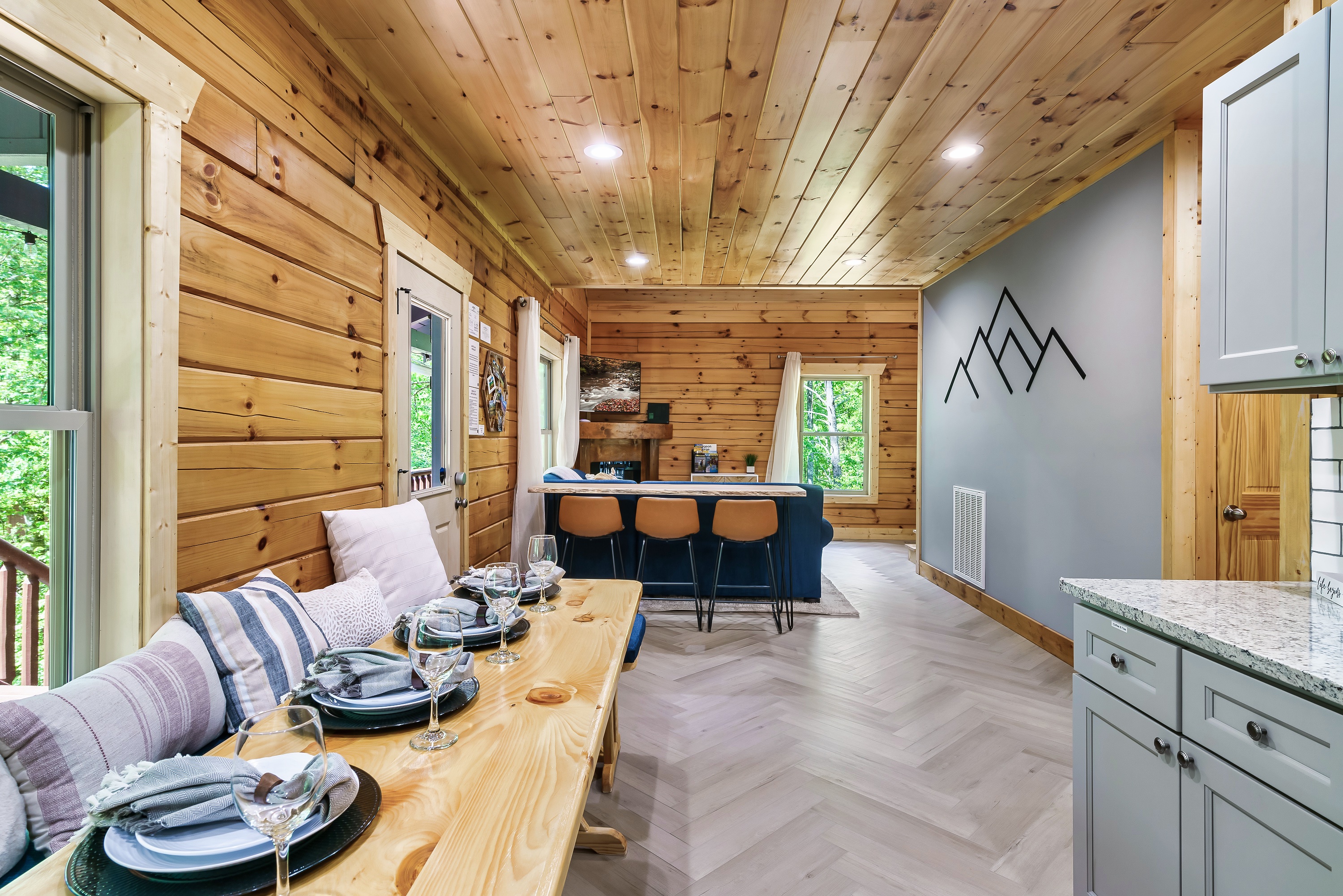 Everyone can feel a part of the group while hanging out in the kitchen or family room. Throw on your favorite show and never miss a minute from anywhere in this room.