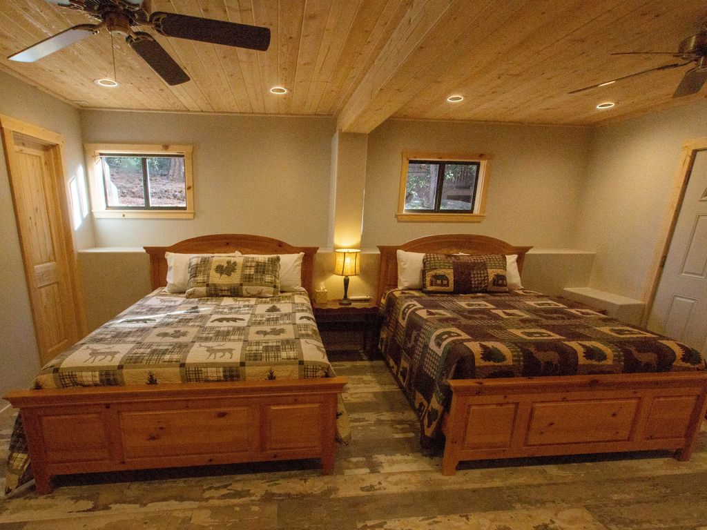 Lower level bed room with 2 Sealy Queen beds