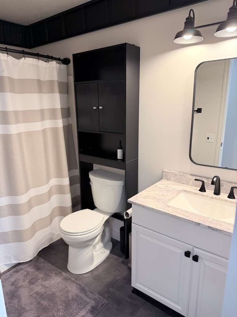 Second full bathroom offering a walk-in shower and plenty of space to get ready comfortably.