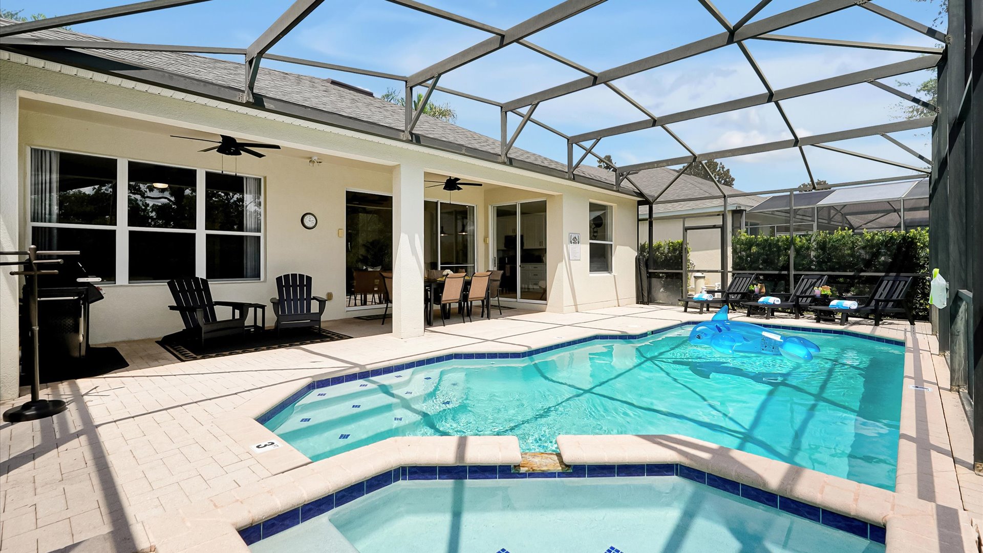 Poolside Lanai: Spacious screened pool deck with a private pool and spa, covered dining area, barbecue and plenty of seating.