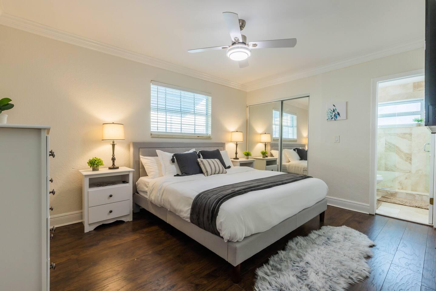 The 1st Bedroom has a King-sized bed, Smart App TV and large white dresser. It also has an en-suite bathroom with shower and new vanity. There is a great walk-in closet with a pack n play and sheets as well as inflatable mattress.