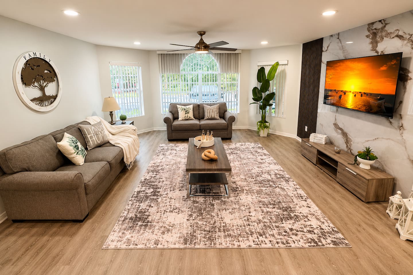 Spacious living room with a comfortable seating area and plenty of room to unwind.