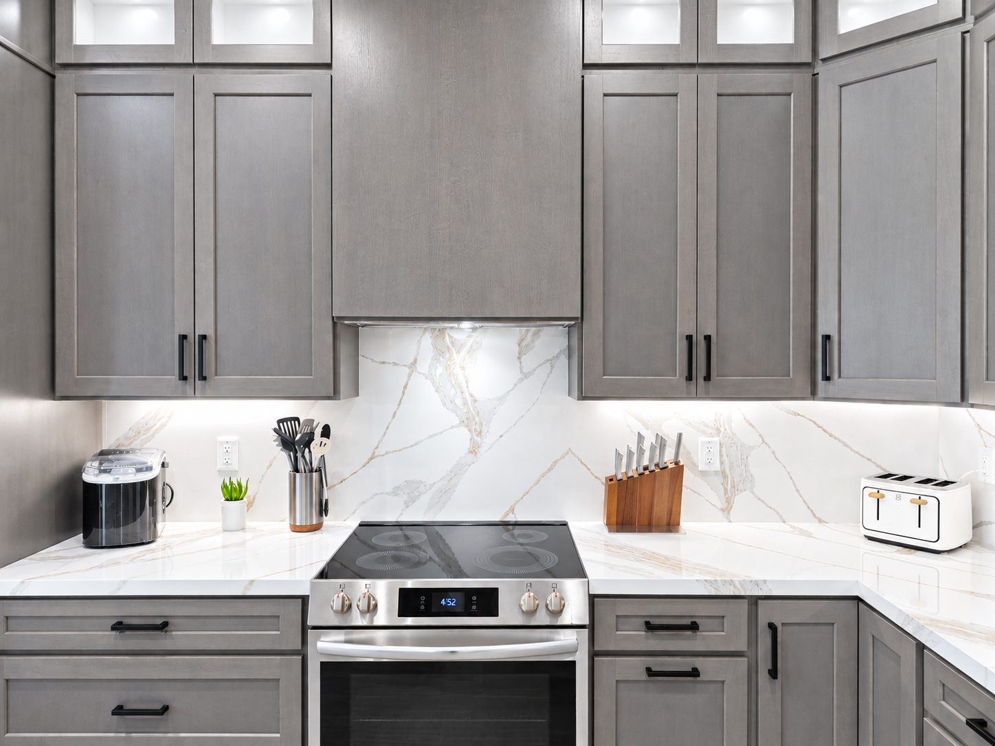 Bright and modern kitchen with stainless steel appliances.