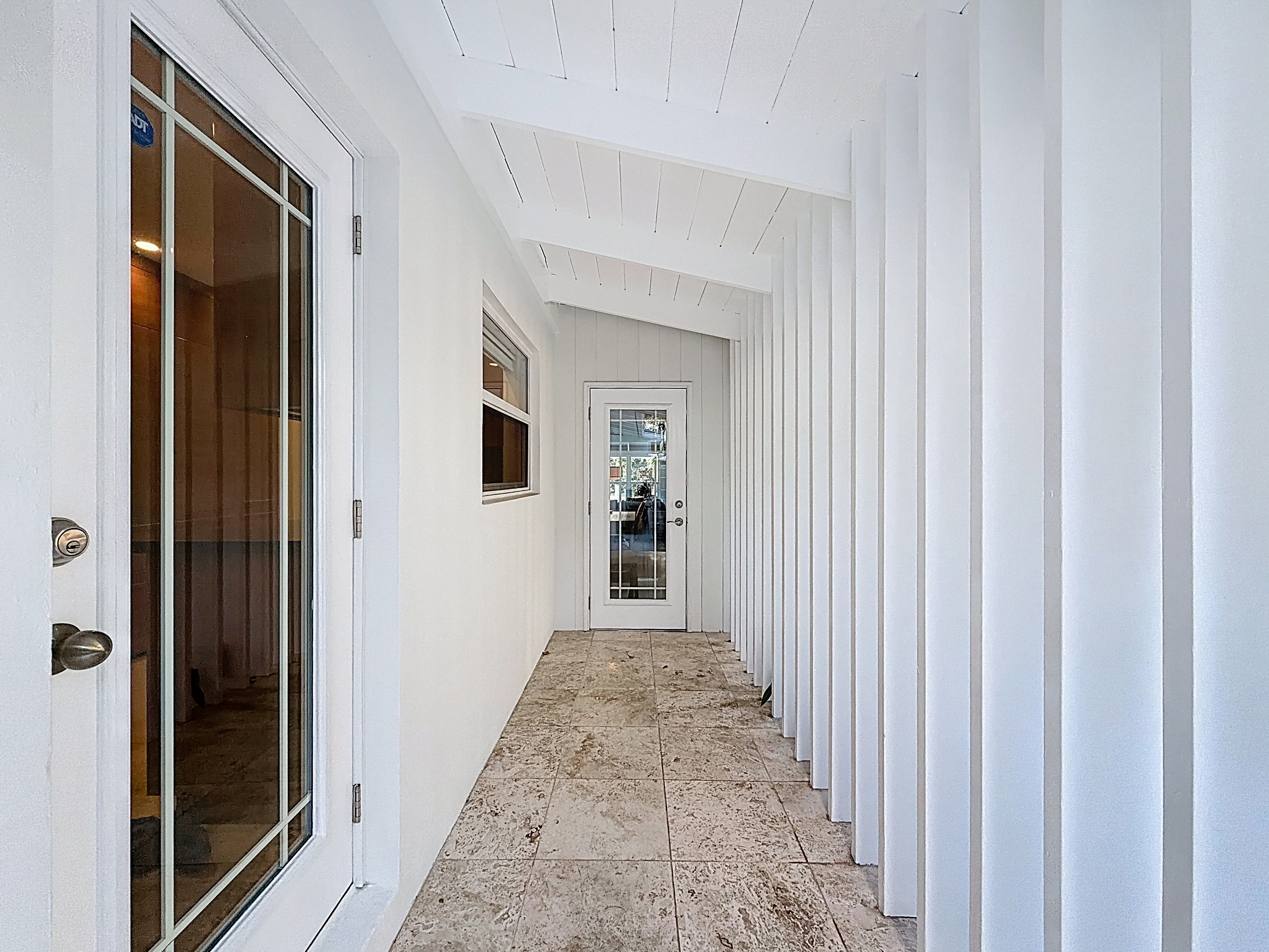 Covered access to the office nook and the kitchen. 