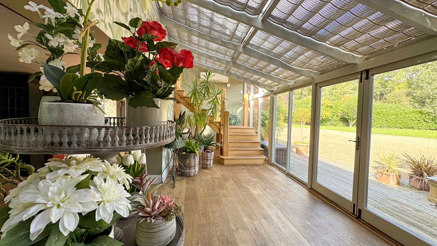 Conservatory with stairs to Grouse and Teal