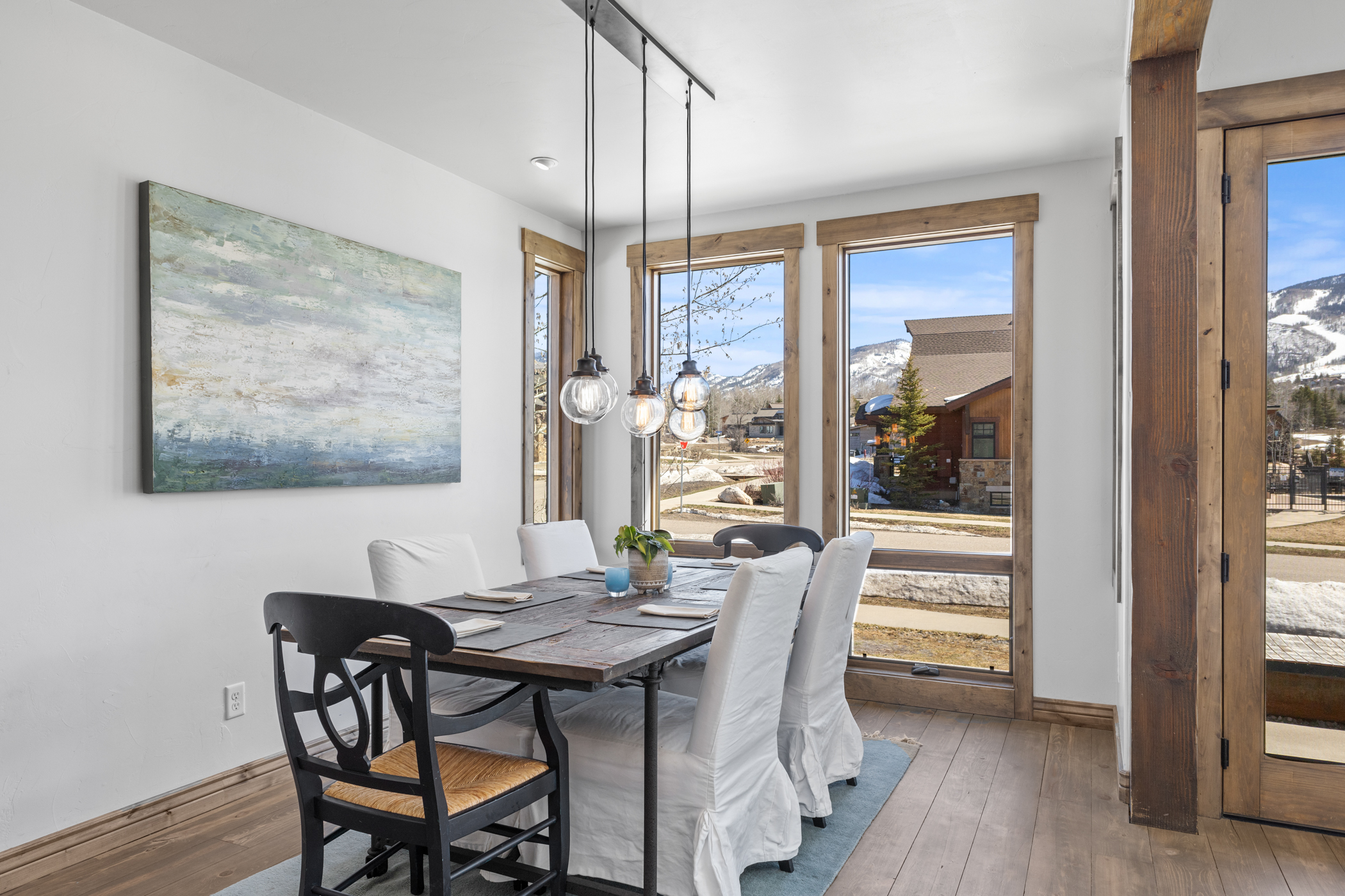 Main Level Dining Room with Deck Access Door