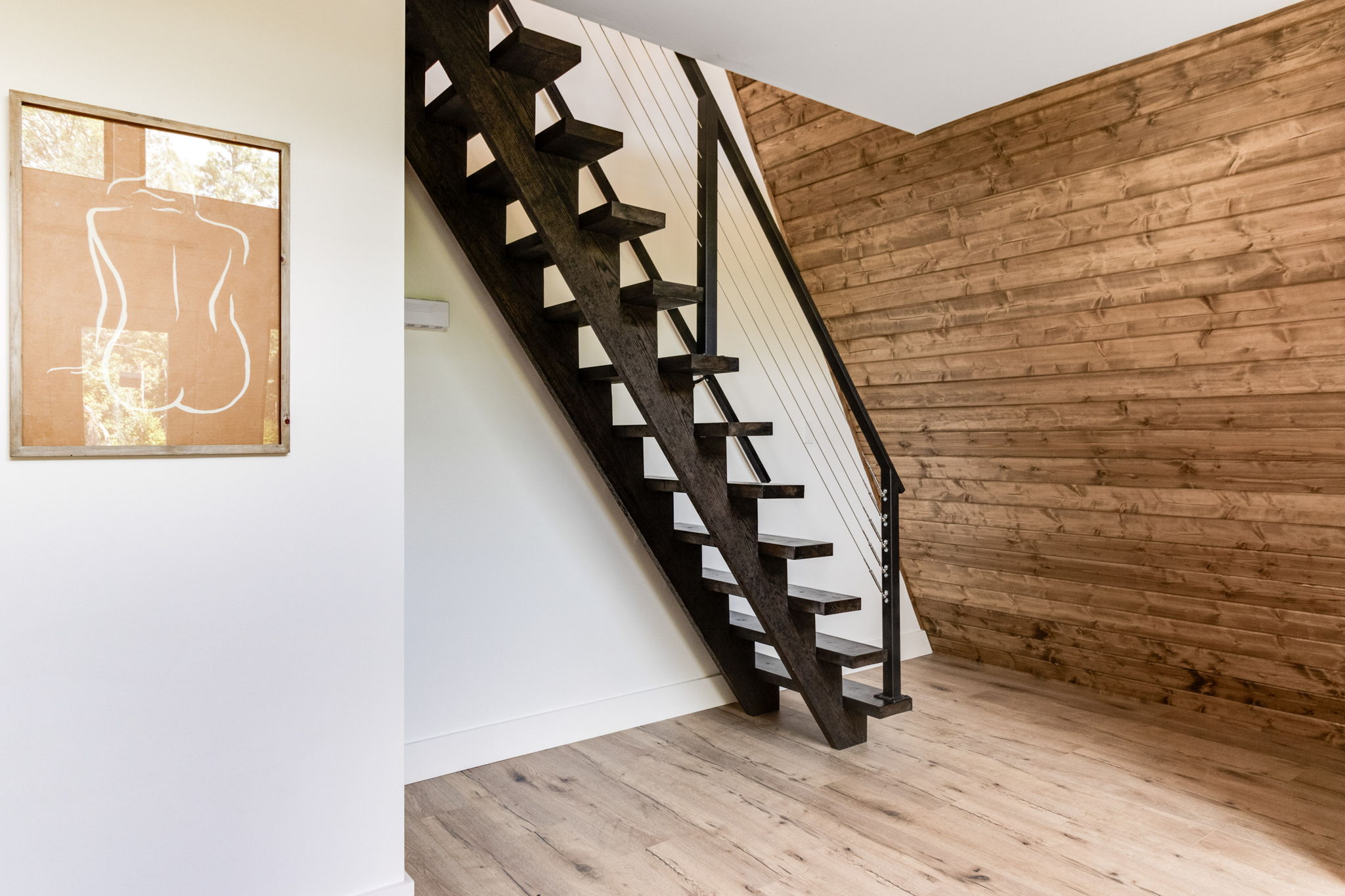 Stairs leading to second floor bedroom