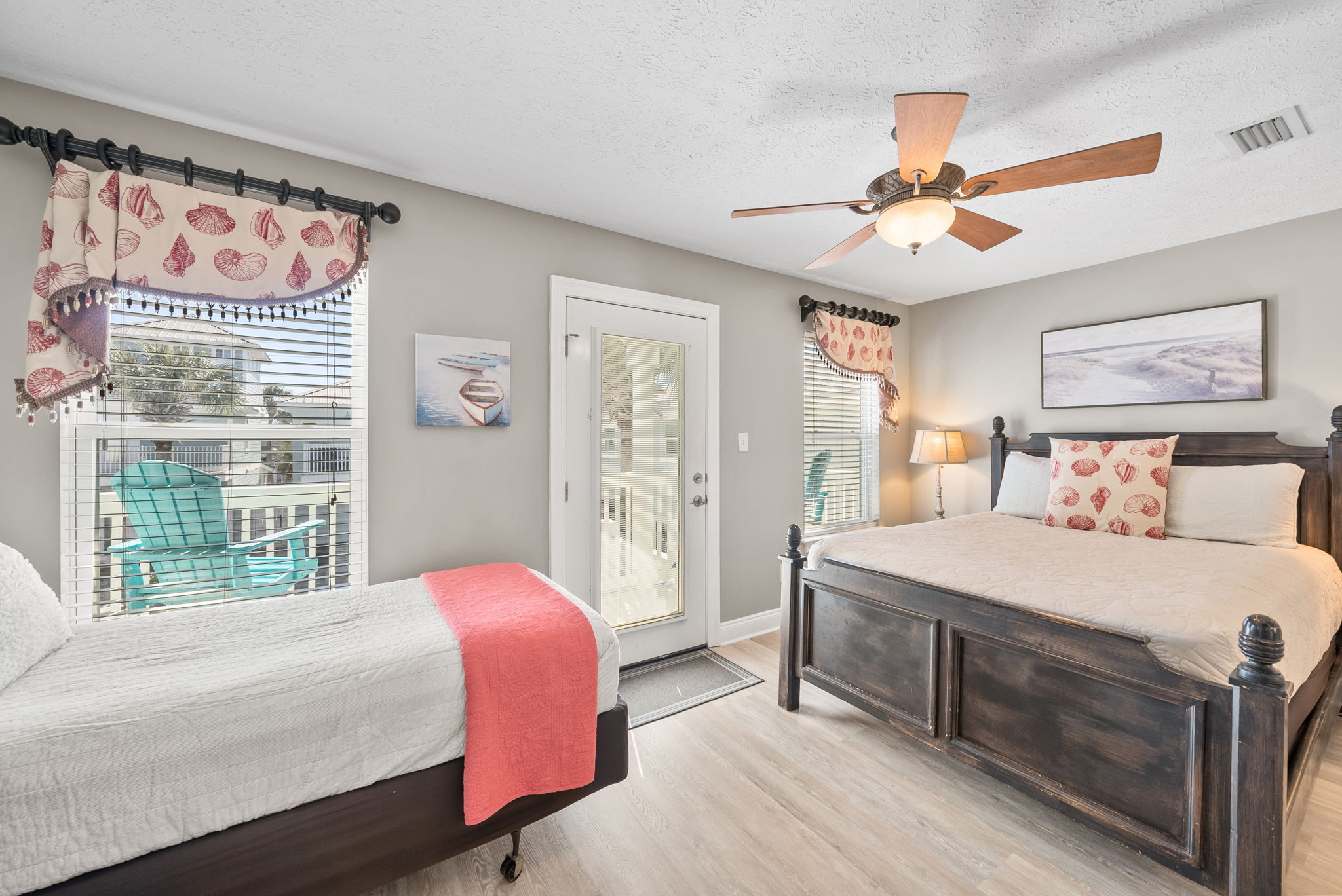 2nd floor queen bed with twin bed. Connects directly to the bathroom. Plus, has a balcony right off of the bedroom that overlooks the pool and has views of the Gulf.