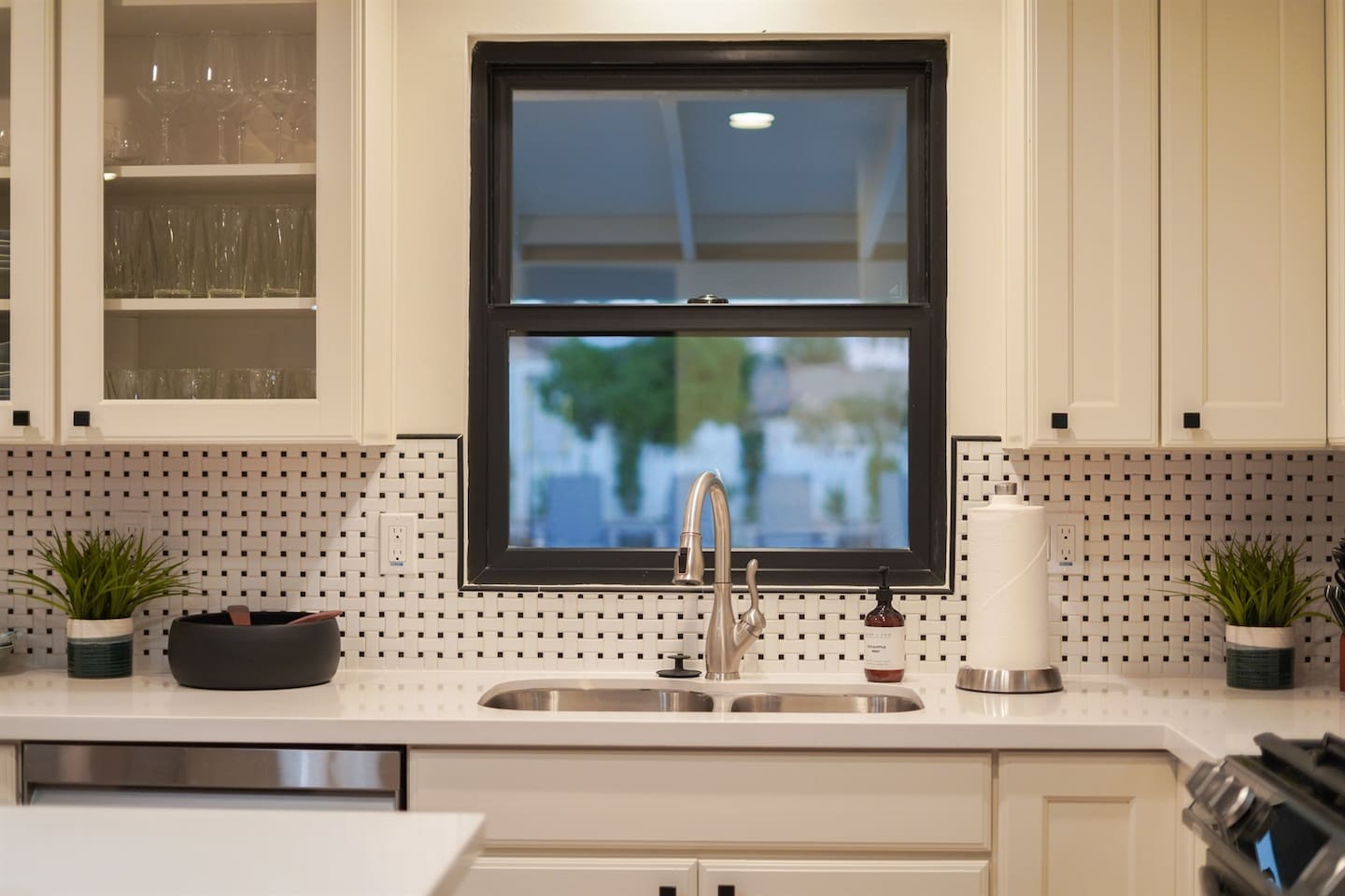 Create memorable meals in the full kitchen, equipped with essential appliances, including a dishwasher and gas range, along with an island that invites seating and conversation.