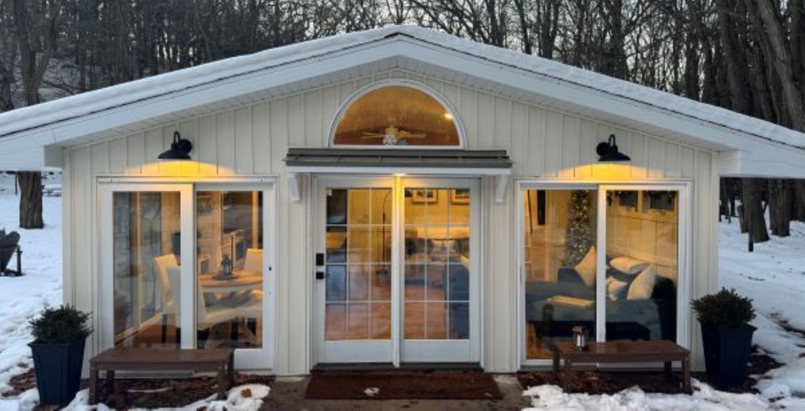 The floor to ceiling glass doors! All windows have adjustable cellular shades.
