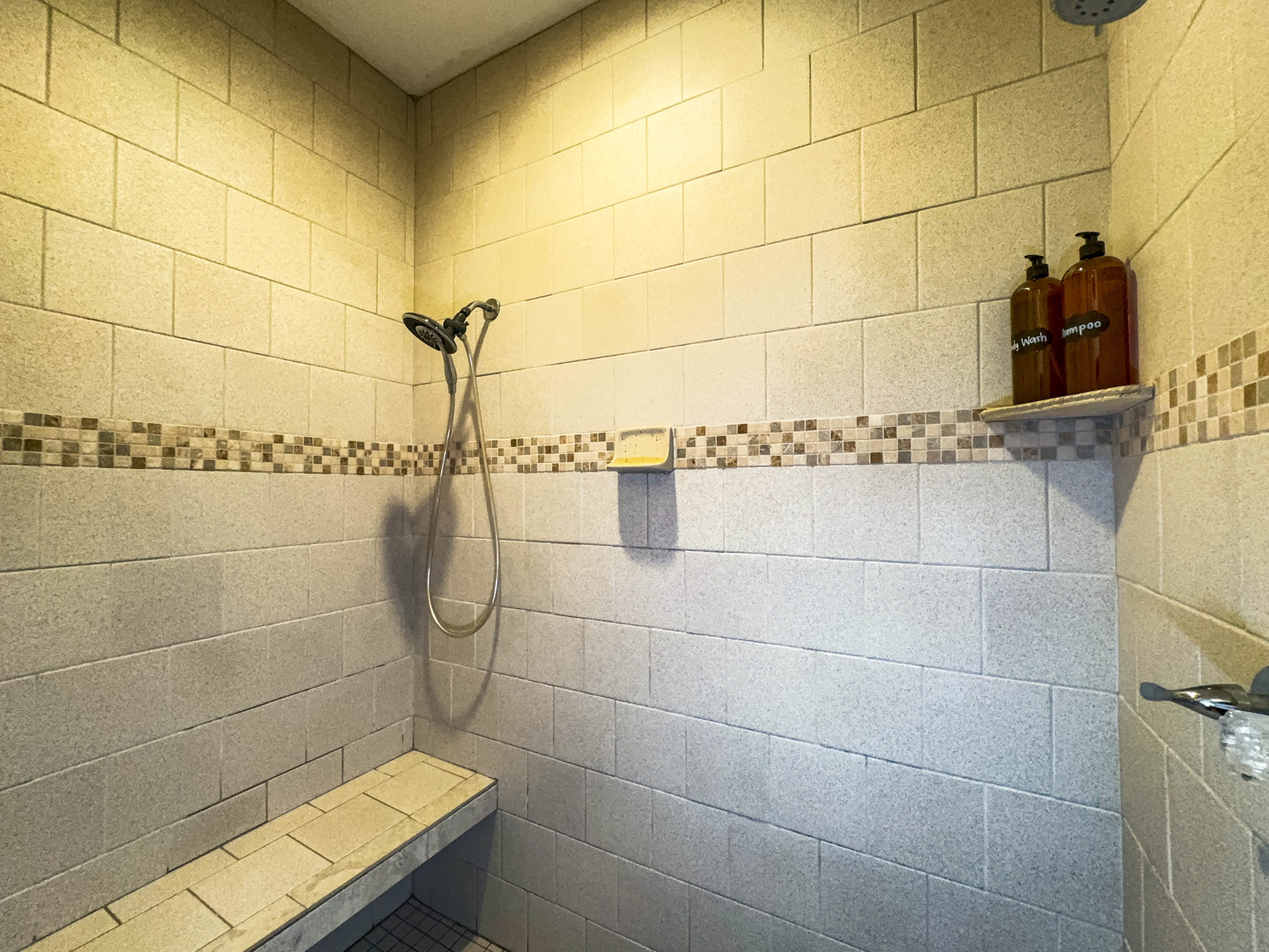 built in bench and double shower head!