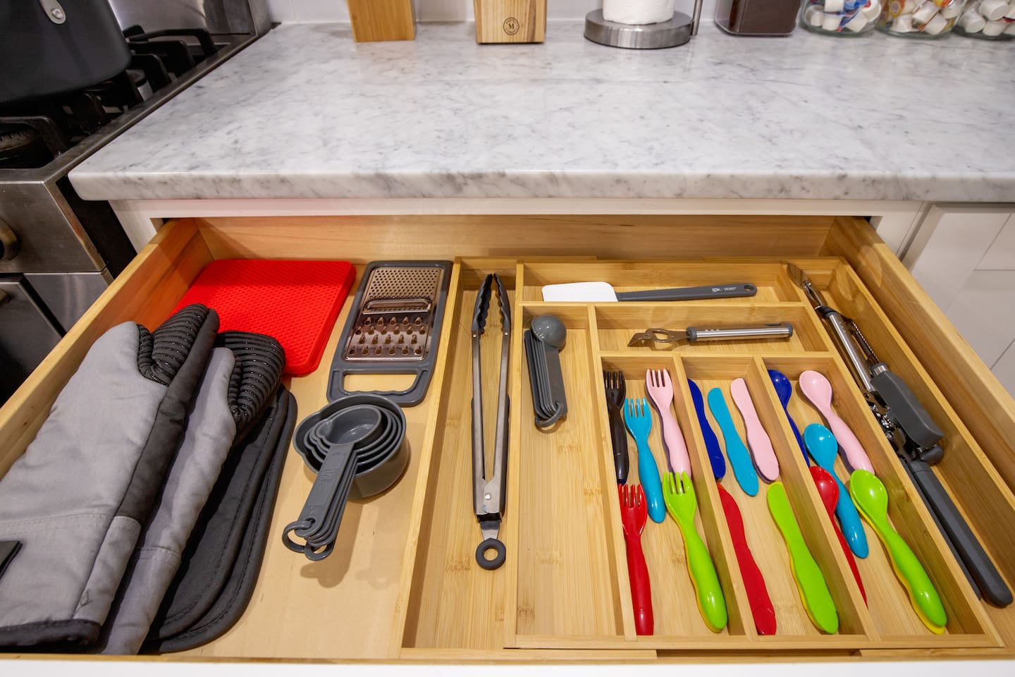 With every drawer you open, discover the joy of a kitchen where organization meets design, ensuring a delightful cooking and dining experience for you and the kids!