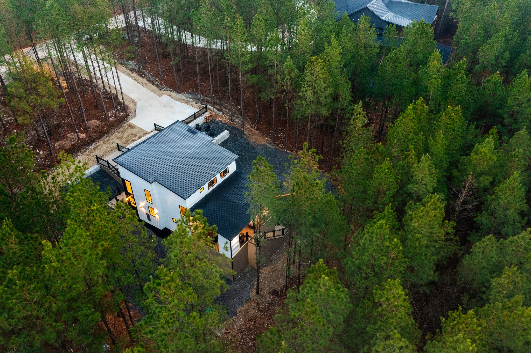 Tucked among towering pines, this modern cabin offers the ultimate private retreat.