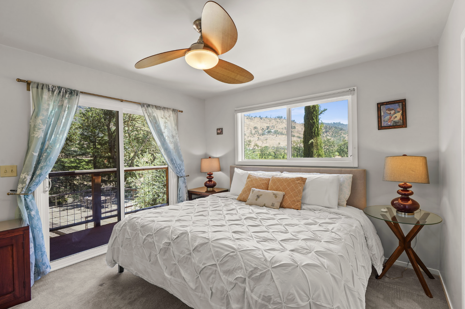 Cozy bedroom with King bed and scenic hillside views