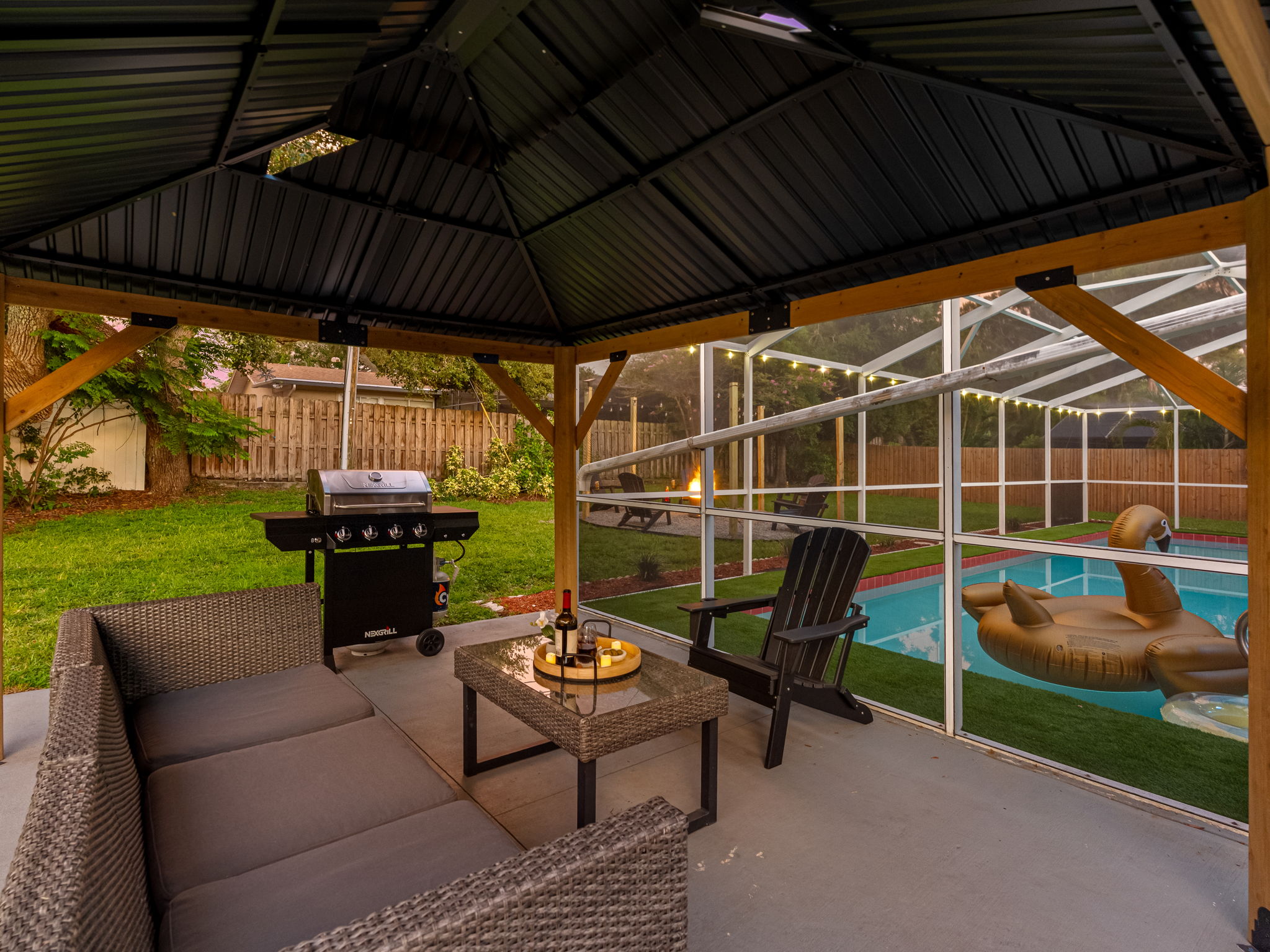 Rain or shine, this covered outdoor space keeps the good times going, offering shade, comfort, and a fantastic setup for outdoor living.