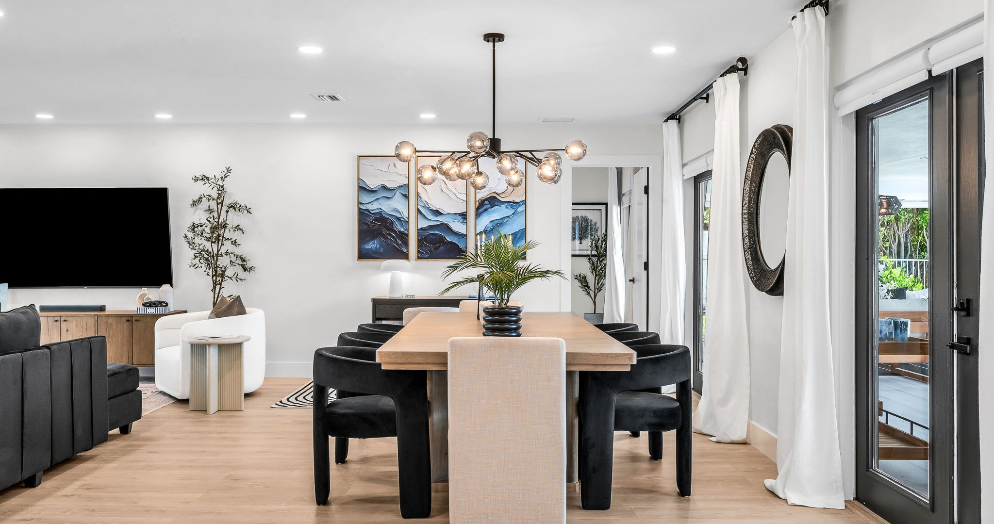 Experience resort-style dining with a designer table for 8 indoors and al fresco seating for 10 by the pool, offering an elegant backdrop for unforgettable gatherings