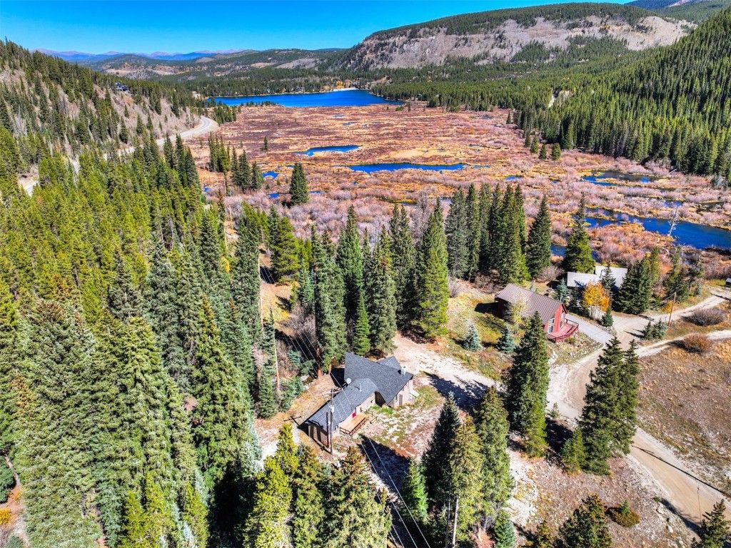 Take in the breathtaking views from your secluded mountain retreat, where endless forest, winding waterways, and wide-open skies surround you and make it all yours to explore.